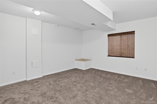 5337 S Ukraine Way, Aurora, CO 80015 - carpeted spare room featuring baseboards