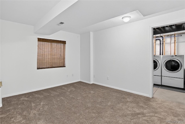 5337 S Ukraine Way, Aurora, CO 80015 - carpeted spare room featuring washer and dryer and baseboards