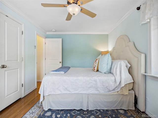 746 Birch St, Denver, CO 80220 - bedroom with crown molding, ceiling fan, and wood finished floors