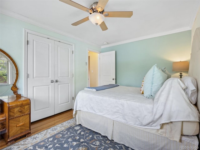 746 Birch St, Denver, CO 80220 - bedroom featuring a ceiling fan, ornamental molding, wood finished floors, and a closet