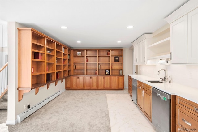 kitchen with light colored carpet, sink, dishwasher, white cabinets, and a baseboard heating unit