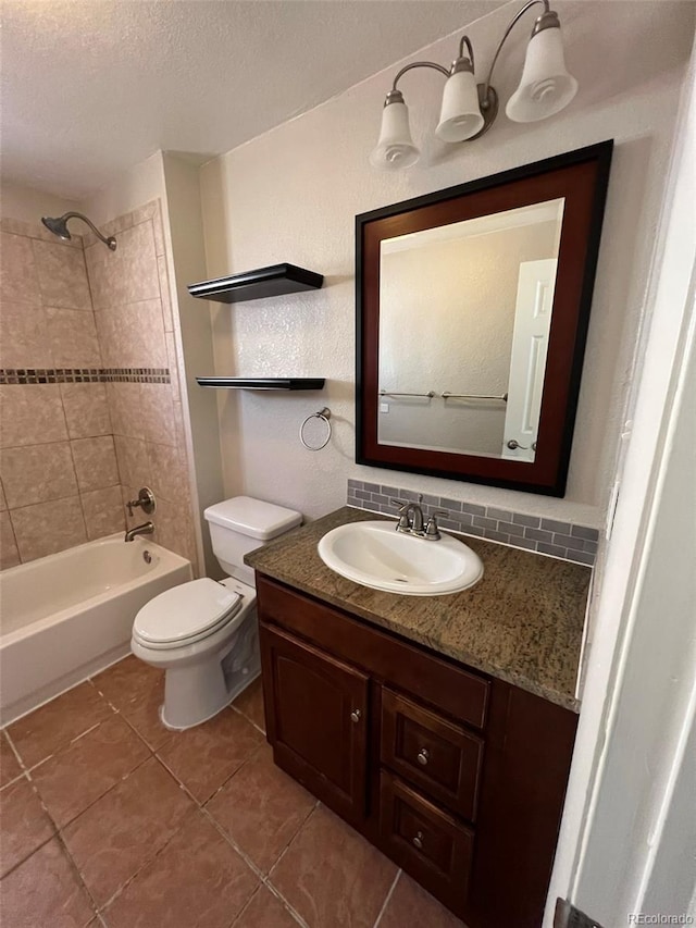 1245 Yates St, Denver, CO 80204 - bathroom with vanity, shower / bathtub combination, tile patterned flooring, and a textured ceiling