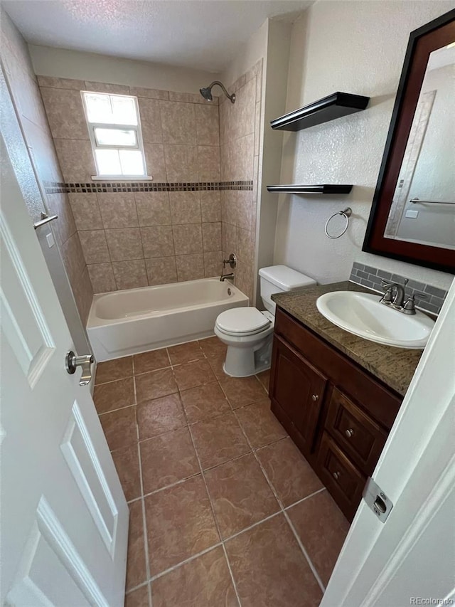 1245 Yates St, Denver, CO 80204 - full bathroom featuring vanity, shower / bath combination, and tile patterned flooring