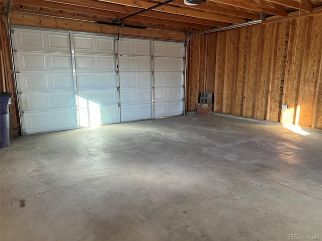 1245 Yates St, Denver, CO 80204 - garage featuring a garage door opener