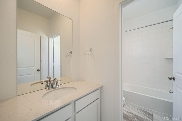 708 N Bently St, Watkins, CO 80137 - bathroom featuring vanity, toilet, shower / bath combination, and marble finish floors