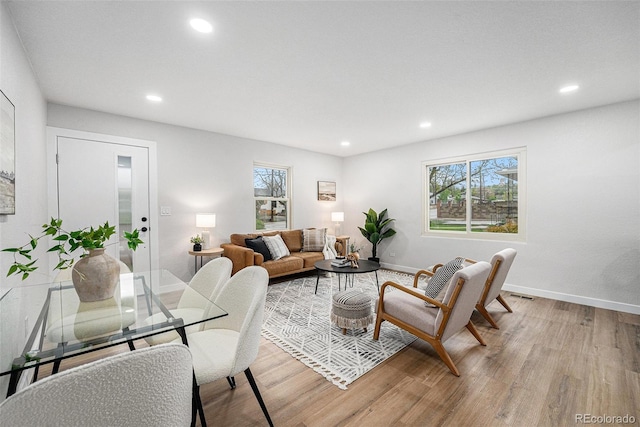 5491 Lowell Blvd, Denver, CO 80221 - living room featuring light wood finished floors, healthy amount of natural light, and recessed lighting