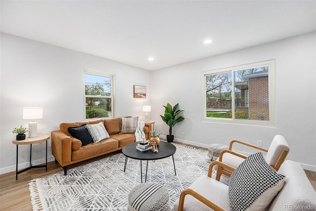 5491 Lowell Blvd, Denver, CO 80221 - living room with healthy amount of natural light, light wood-style floors, and recessed lighting
