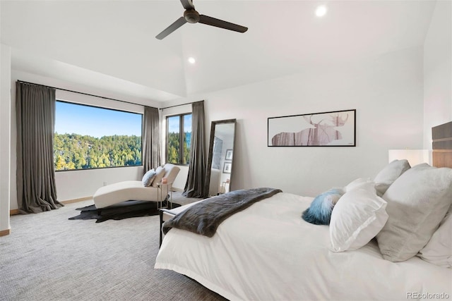 carpeted bedroom featuring lofted ceiling, ceiling fan, baseboards, and recessed lighting