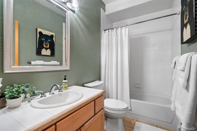 bathroom with tile patterned flooring, shower / tub combo with curtain, vanity, and toilet