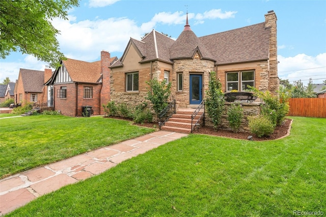 view of front of house with a front lawn