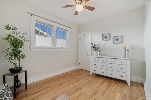 bedroom featuring ceiling fan and light hardwood / wood-style floors