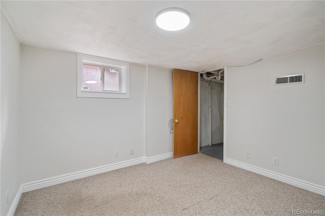 basement featuring carpet flooring