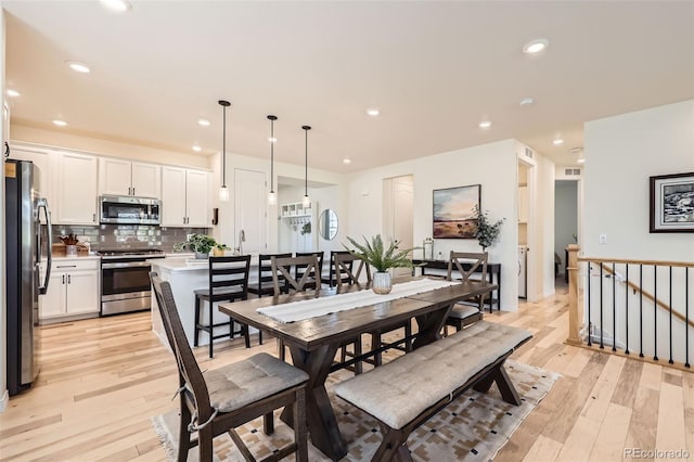 515 176th Ave, Broomfield, CO 80023 - dining room featuring light wood finished floors and recessed lighting