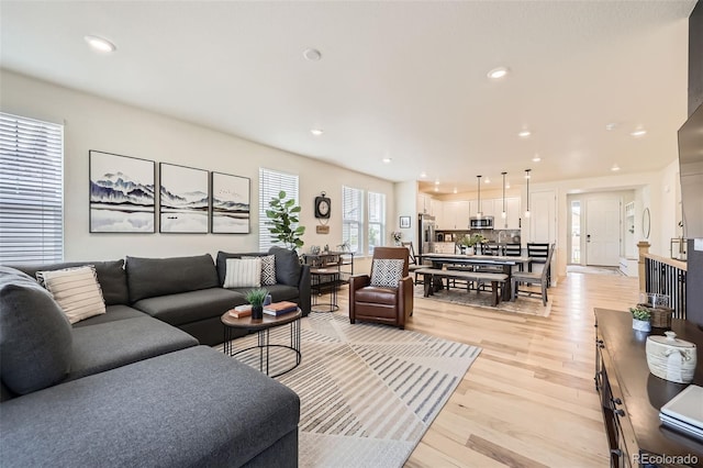 515 176th Ave, Broomfield, CO 80023 - living room with light wood finished floors and recessed lighting