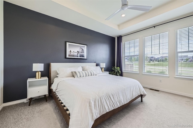 515 176th Ave, Broomfield, CO 80023 - carpeted bedroom with baseboards, ceiling fan, and a tray ceiling