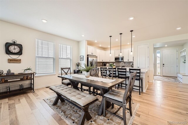 515 176th Ave, Broomfield, CO 80023 - dining room featuring light wood-style floors and recessed lighting