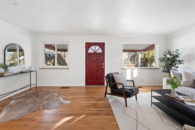 foyer with light wood-type flooring