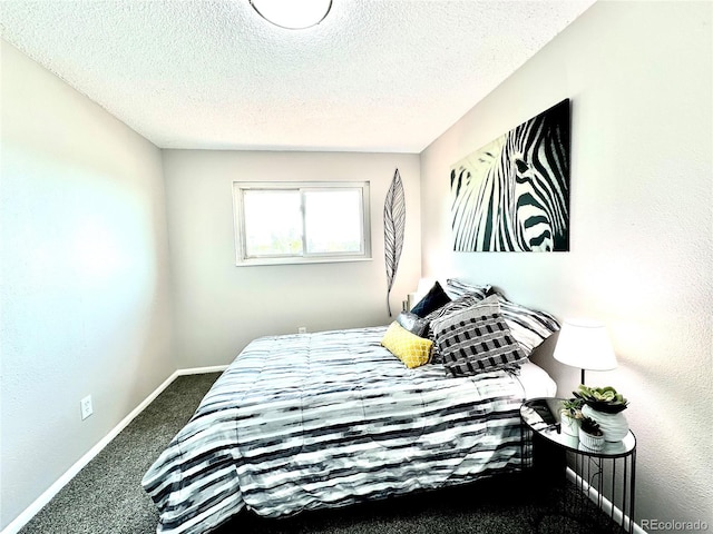 8820 Cody St, Broomfield, CO 80021 - bedroom featuring carpet, a textured ceiling, and baseboards