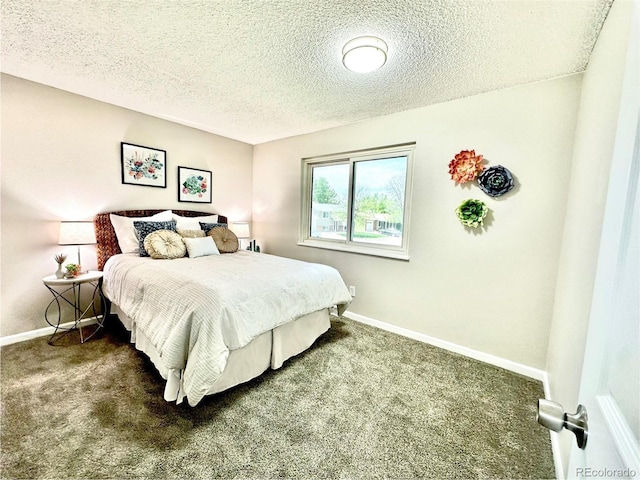 8820 Cody St, Broomfield, CO 80021 - carpeted bedroom featuring a textured ceiling and baseboards
