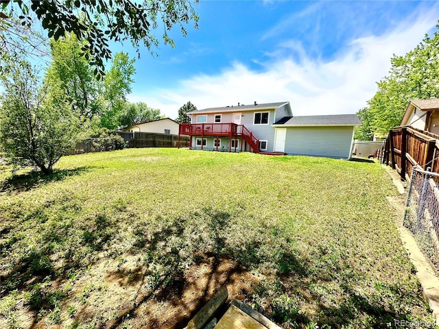 8820 Cody St, Broomfield, CO 80021 - view of yard with stairway and a wooden deck