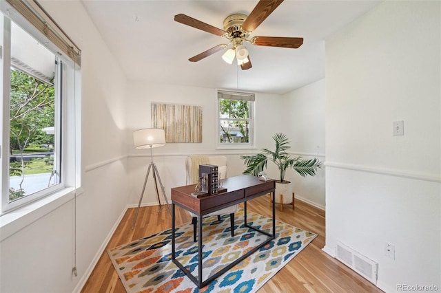 1370 S Hudson St, Denver, CO 80222 - office space with a ceiling fan, wood finished floors, and baseboards