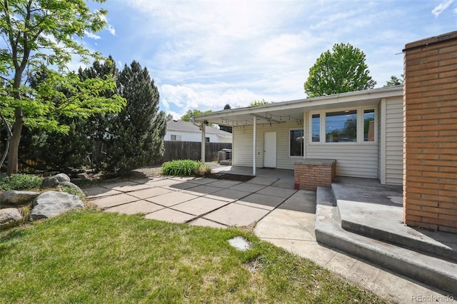 1370 S Hudson St, Denver, CO 80222 - rear view of property with a patio