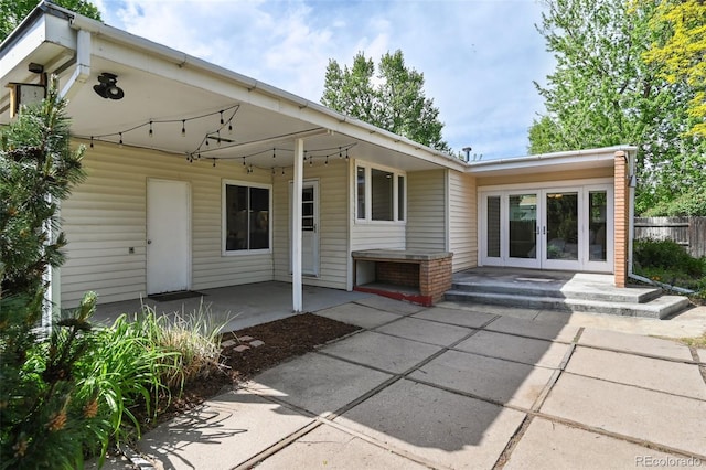 1370 S Hudson St, Denver, CO 80222 - rear view of house featuring a patio and french doors