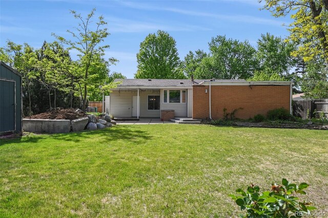 1370 S Hudson St, Denver, CO 80222 - rear view of house with a patio