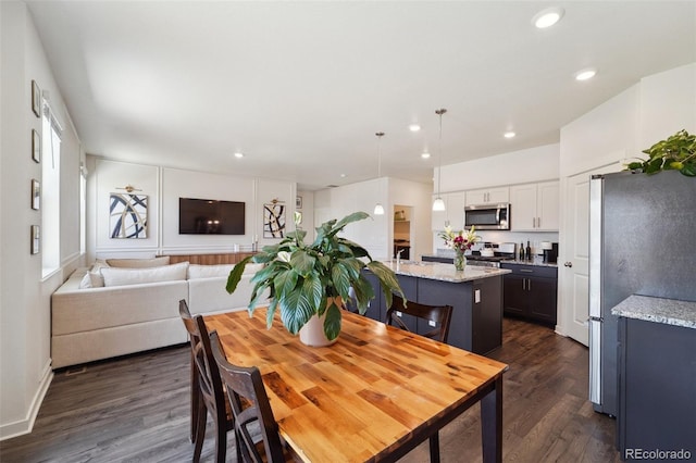 2226 Monte Vista St, Fort Lupton, CO 80621 - dining room with dark wood-type flooring and recessed lighting