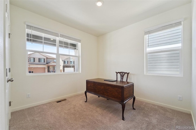 2226 Monte Vista St, Fort Lupton, CO 80621 - home office featuring carpet floors, plenty of natural light, baseboards, and visible vents