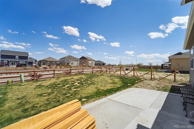 2226 Monte Vista St, Fort Lupton, CO 80621 - view of yard featuring a fenced backyard, a patio area, and a residential view