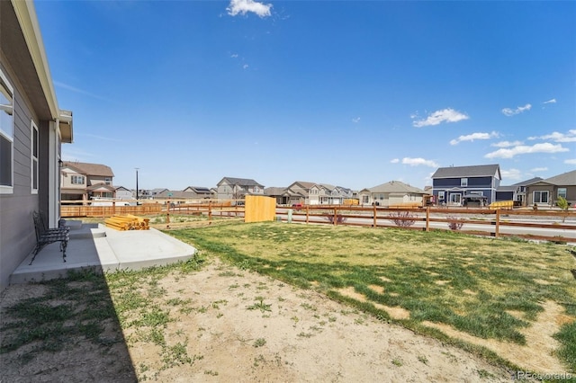 2226 Monte Vista St, Fort Lupton, CO 80621 - view of yard with a residential view, a patio, and a fenced backyard