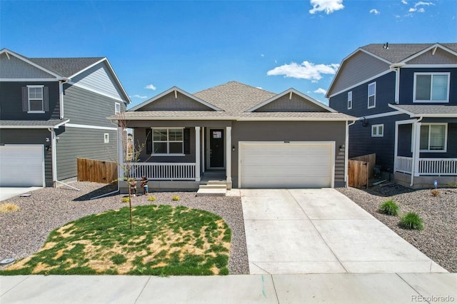 2226 Monte Vista St, Fort Lupton, CO 80621 - craftsman-style house featuring a garage, fence, roof with shingles, concrete driveway, and a porch