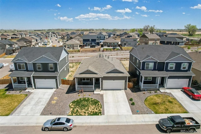 2226 Monte Vista St, Fort Lupton, CO 80621 - view of front of house featuring fence, driveway, a residential view, and a shingled roof
