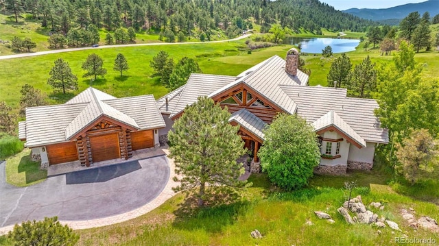 28267 Meadowlark Dr, Golden, CO 80401 - aerial view of property and surrounding area featuring a water and mountain view