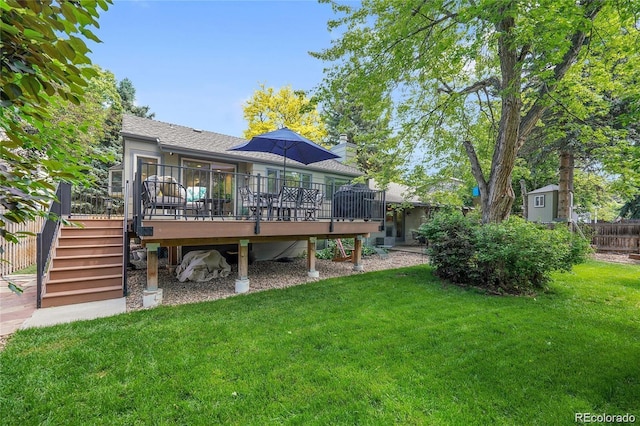 5050 W 102nd Ave, Westminster, CO 80031 - rear view of house with a yard, a deck, stairs, and a shingled roof