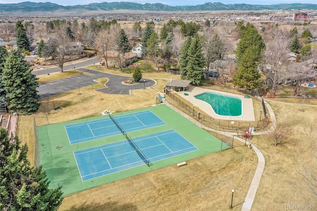 5050 W 102nd Ave, Westminster, CO 80031 - drone / aerial view of a mountain backdrop and a pool area