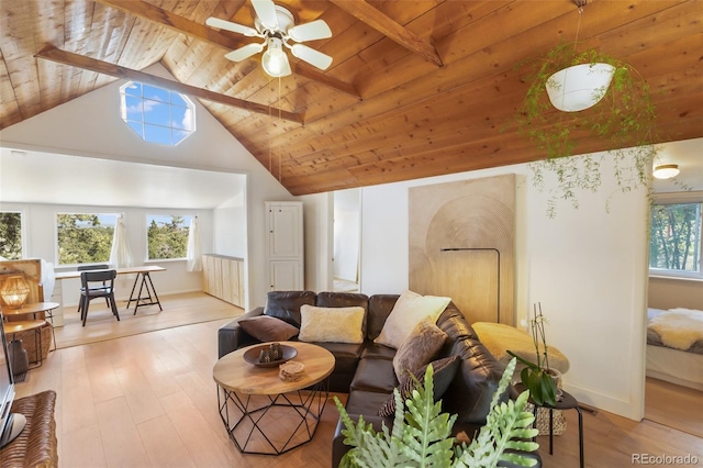 426 Corona Ave, Palmer Lake, CO 80133 - living area featuring healthy amount of natural light, a wooden ceiling with exposed beams, wood-type flooring, ceiling fan, and high vaulted ceiling