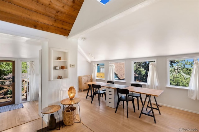 426 Corona Ave, Palmer Lake, CO 80133 - dining space with light wood-style floors and built in features