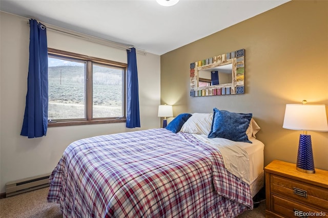 carpeted bedroom featuring a baseboard radiator