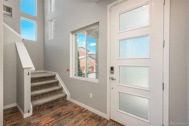 9781 Dunning Cir, Highlands Ranch, CO 80129 - entryway with stairs and dark wood-type flooring