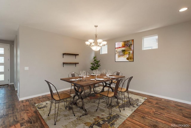 9781 Dunning Cir, Highlands Ranch, CO 80129 - dining space with a chandelier, wood finished floors, and recessed lighting