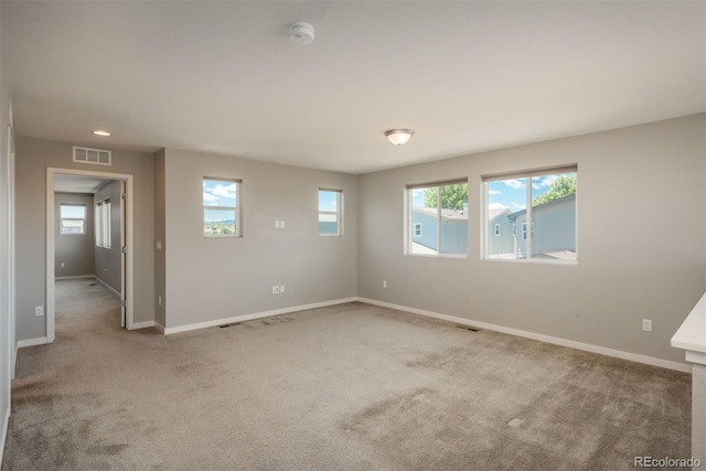 9781 Dunning Cir, Highlands Ranch, CO 80129 - spare room featuring a smoke detector and carpet