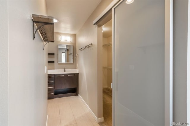 9781 Dunning Cir, Highlands Ranch, CO 80129 - hallway featuring baseboards