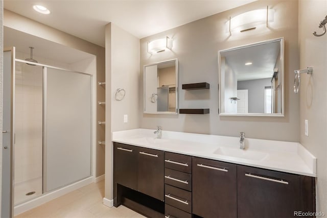 9781 Dunning Cir, Highlands Ranch, CO 80129 - bathroom with a shower stall and double vanity