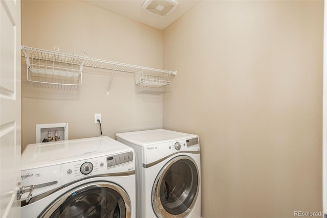 9781 Dunning Cir, Highlands Ranch, CO 80129 - laundry room with washing machine and dryer