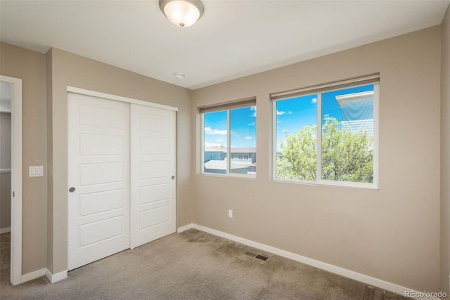 9781 Dunning Cir, Highlands Ranch, CO 80129 - unfurnished bedroom with carpet and a closet