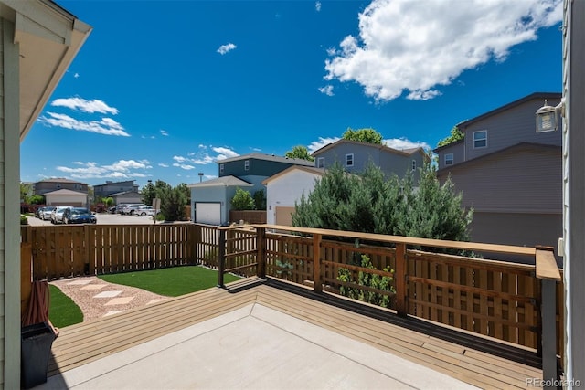 9781 Dunning Cir, Highlands Ranch, CO 80129 - wooden deck featuring a residential view and a fenced backyard