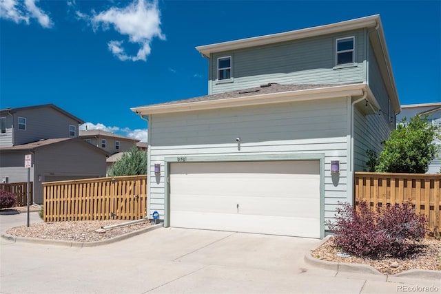 9781 Dunning Cir, Highlands Ranch, CO 80129 - garage featuring concrete driveway