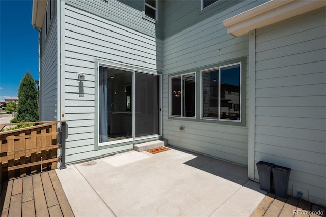 9781 Dunning Cir, Highlands Ranch, CO 80129 - wooden terrace featuring a patio area